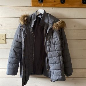 Gray winter coat with multiple layer/zippers with fur on hood